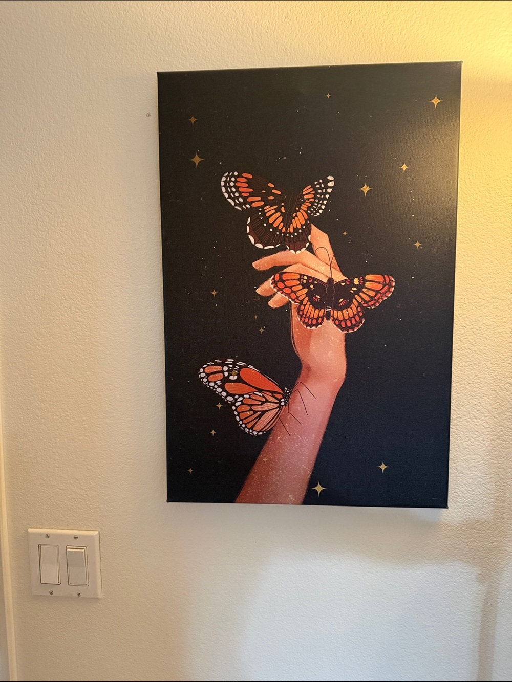 Butterfly and hand Wall Art